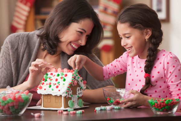 Women and daughter playing