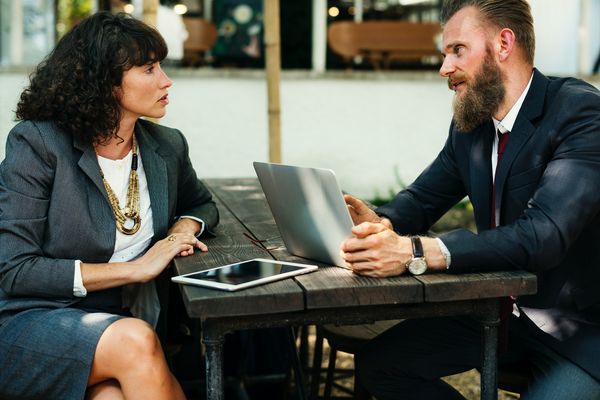 two colleagues speaking