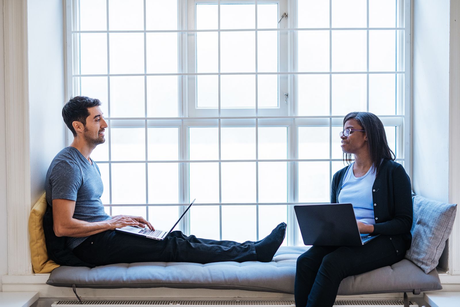 Coworkers sitting in natural light