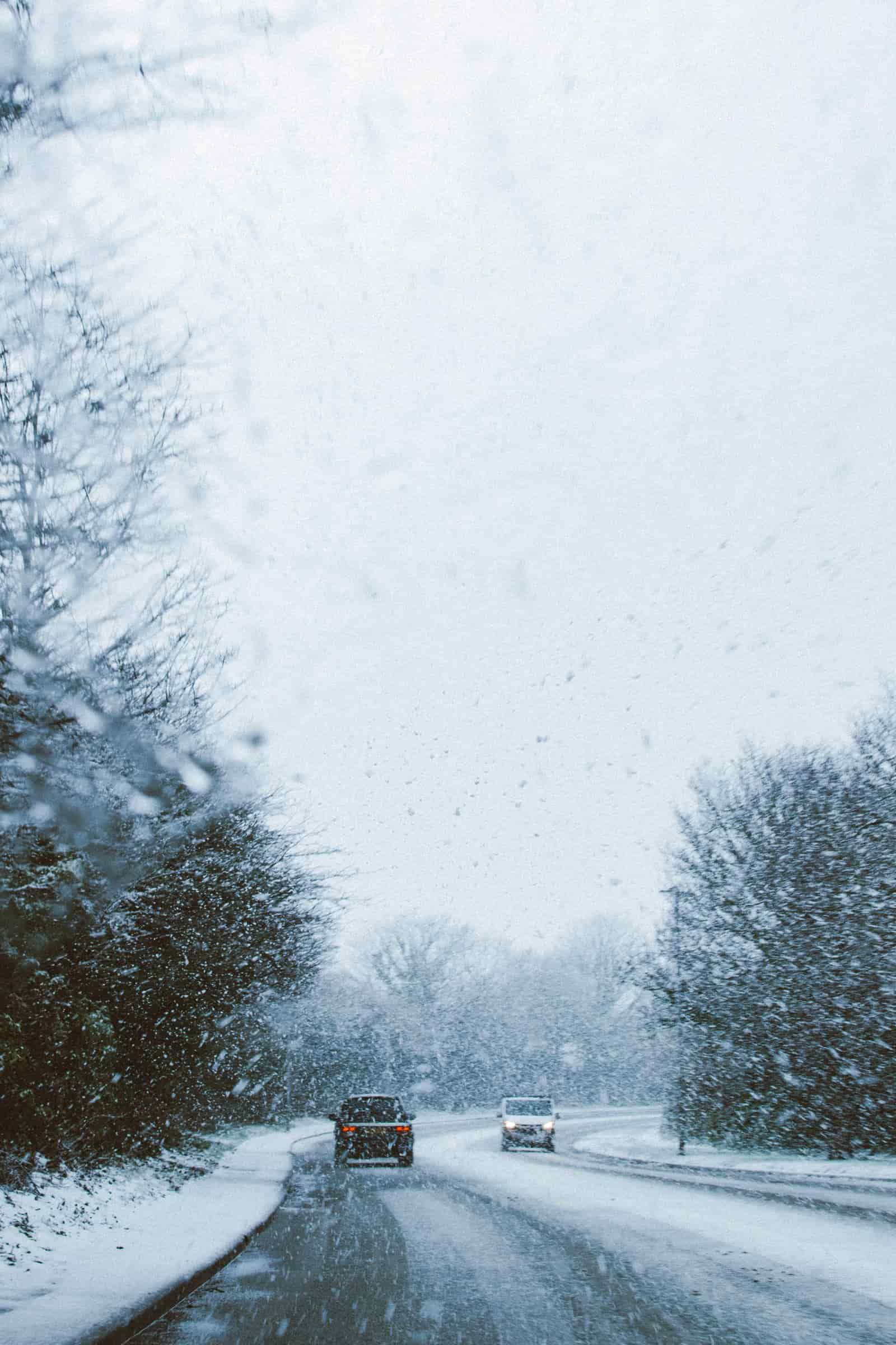 Cars on road during snowstorm