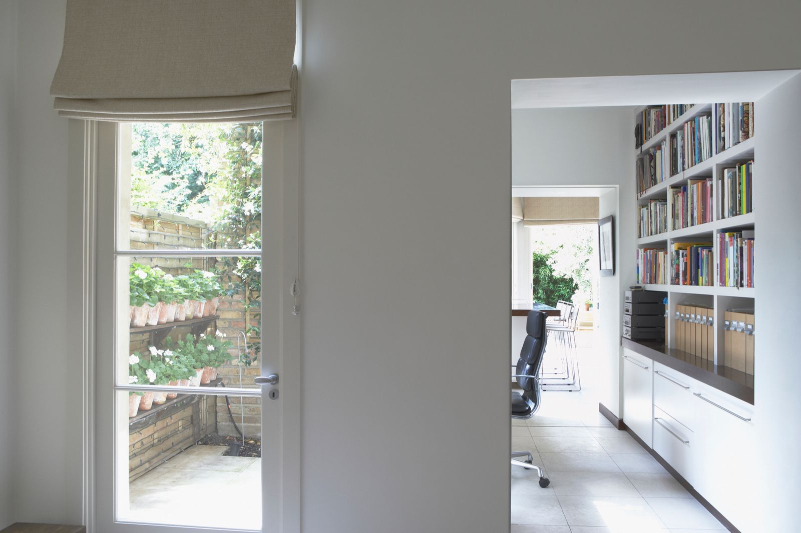 Floor-to-ceiling shelves in a home office