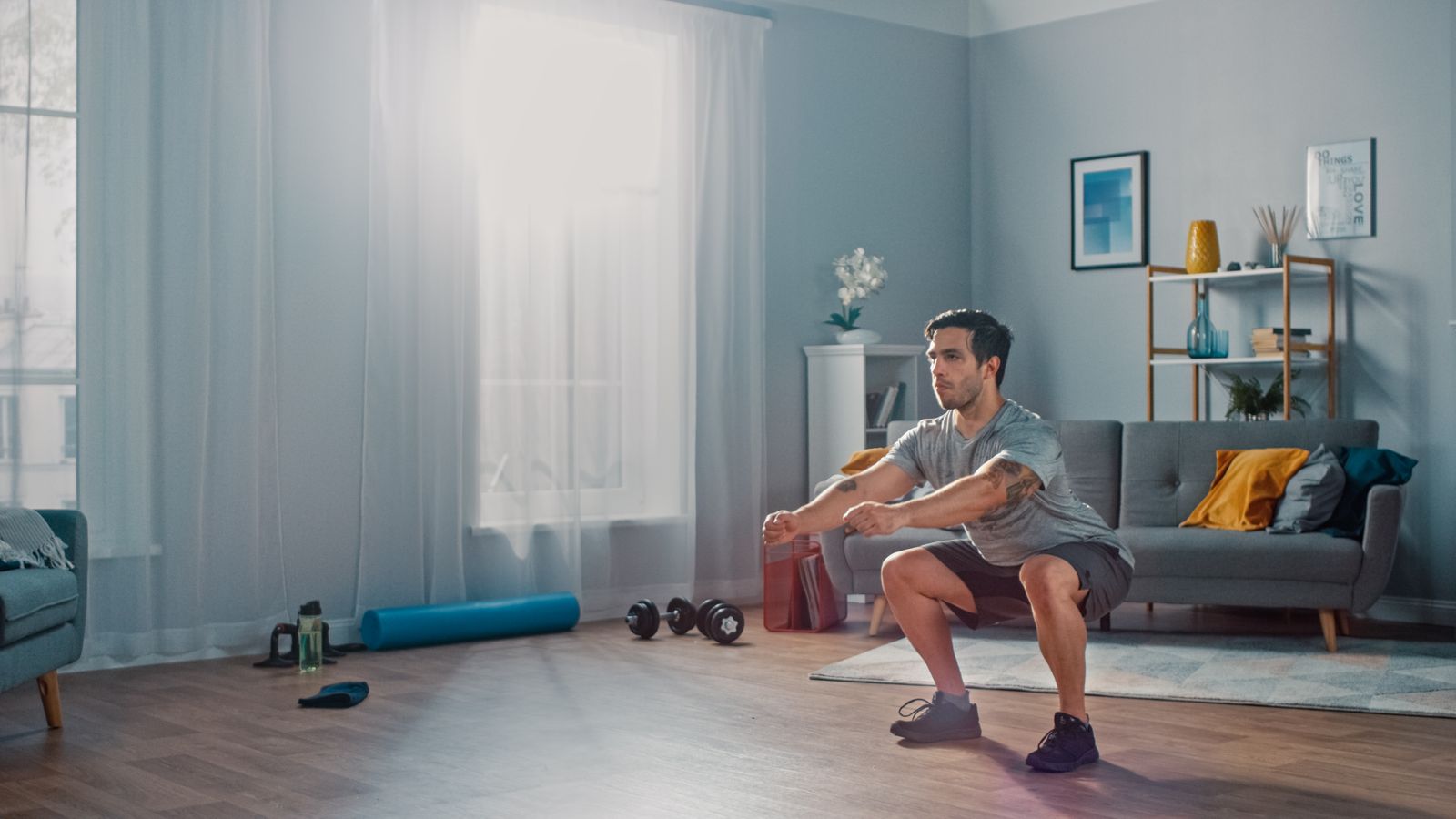 Man working out in living room