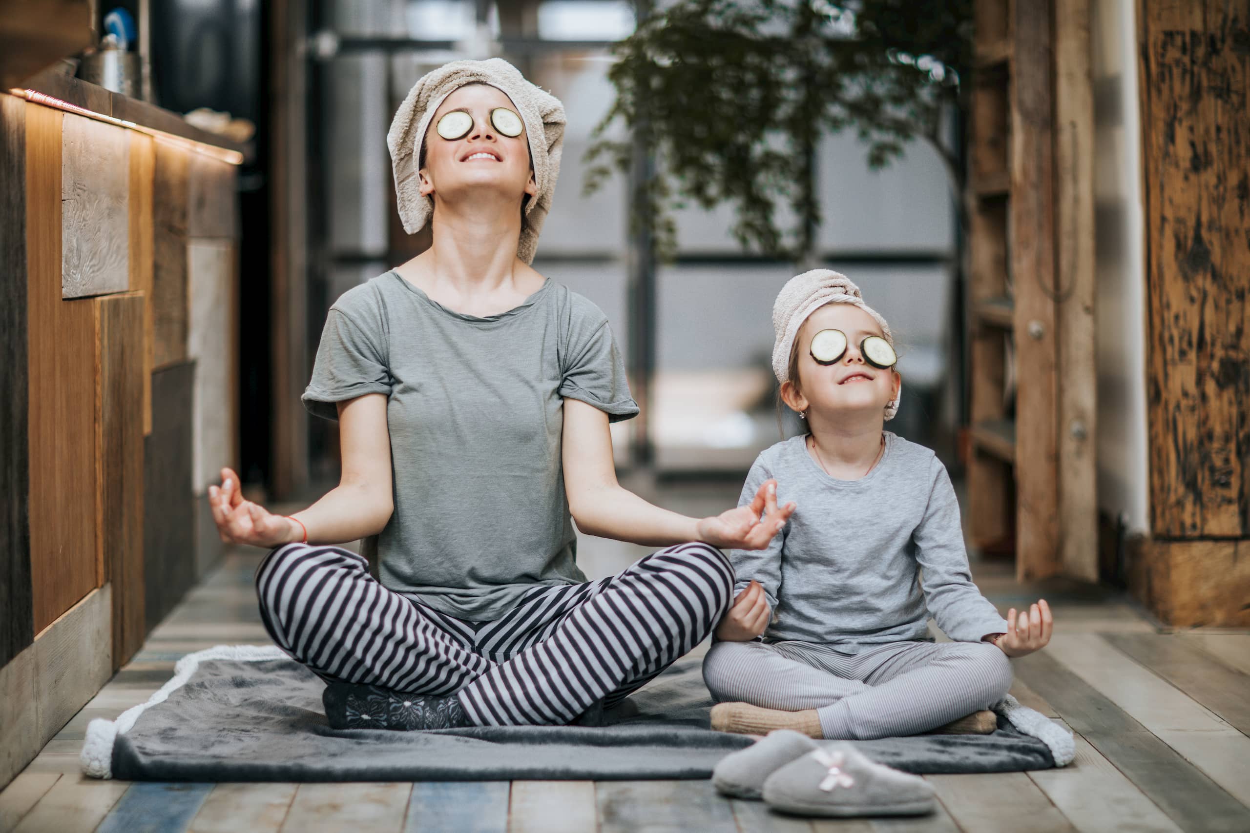 Mother and daughter yoga session