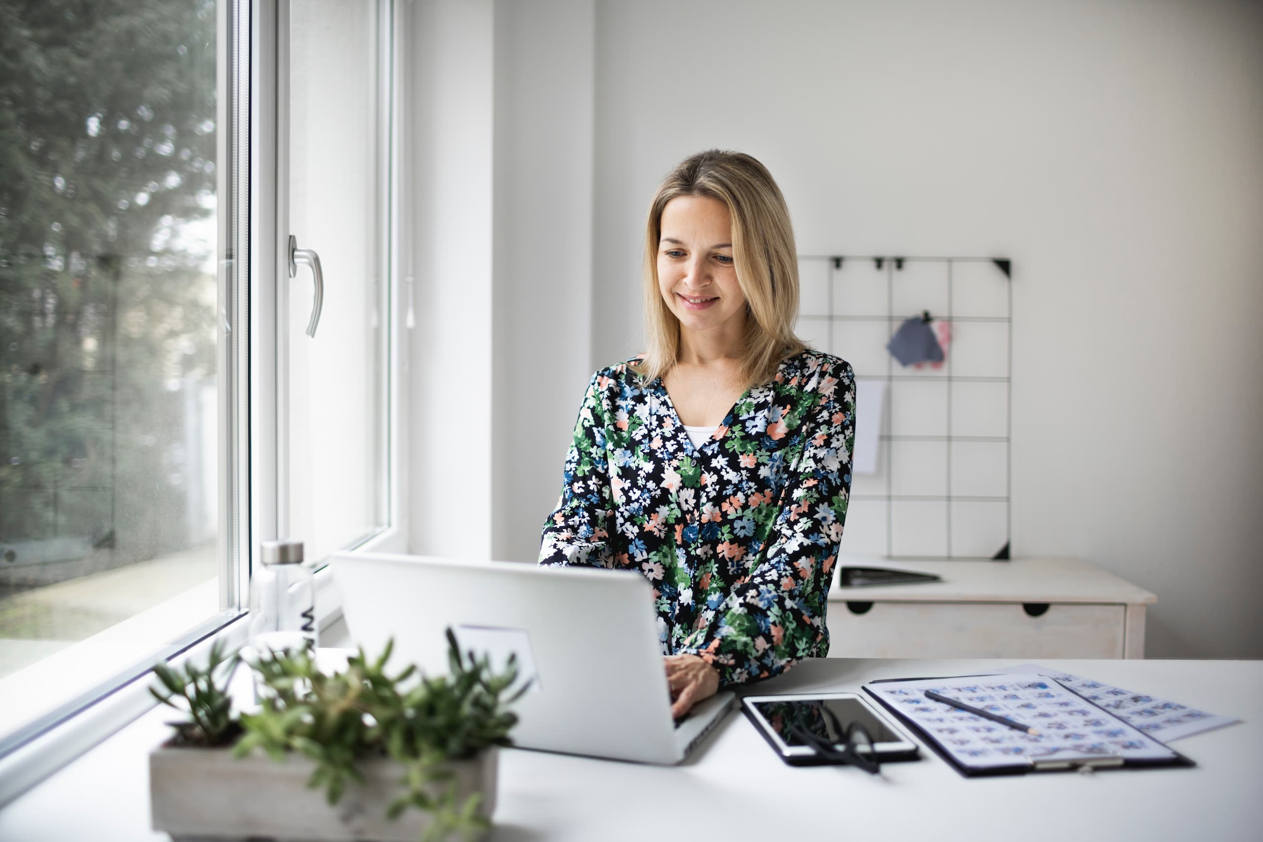 Woman working at a standing desk