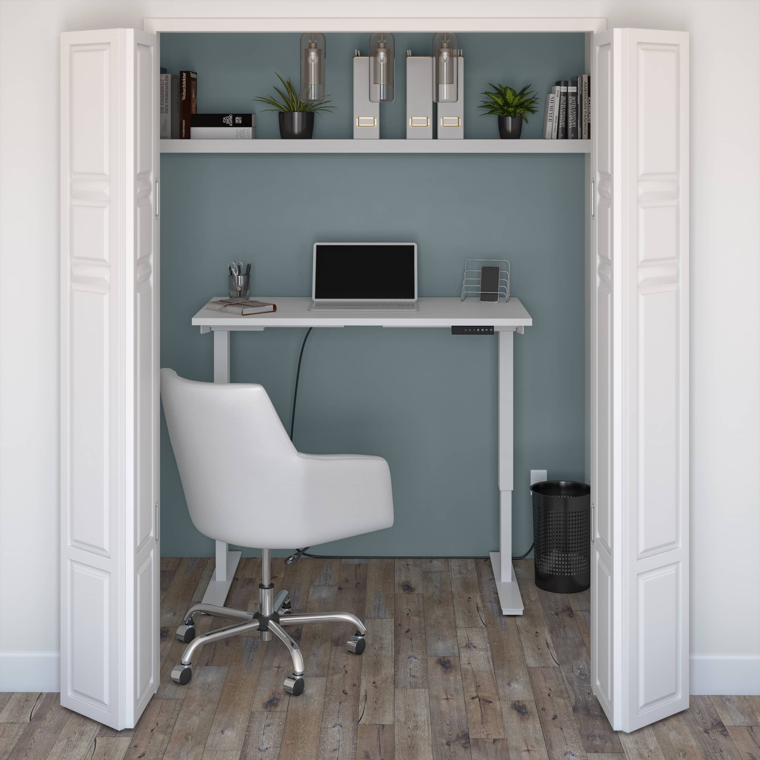 Small standing desk in a closet for a secret study space