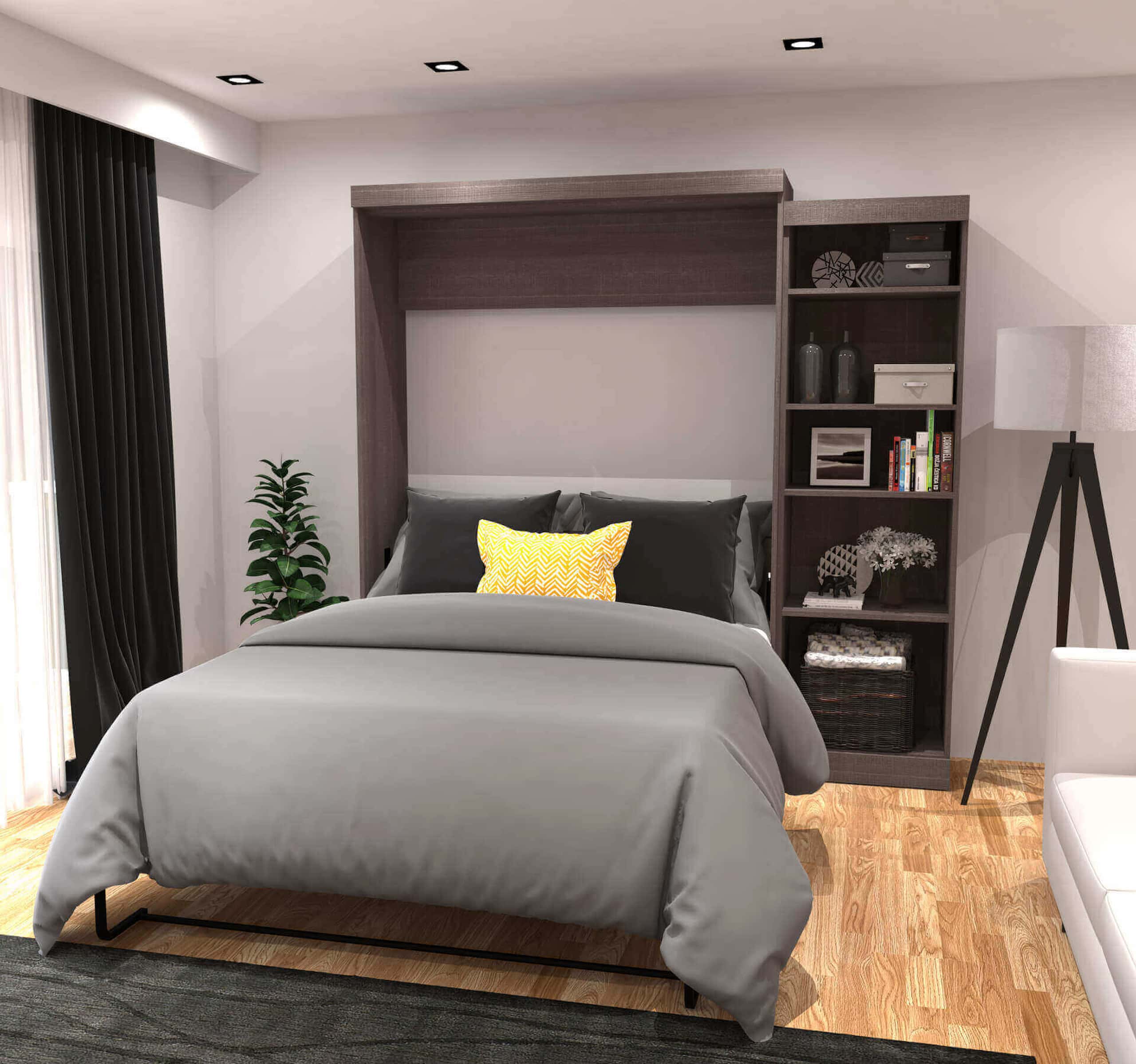 Guest bedroom featuring a Murphy bed a