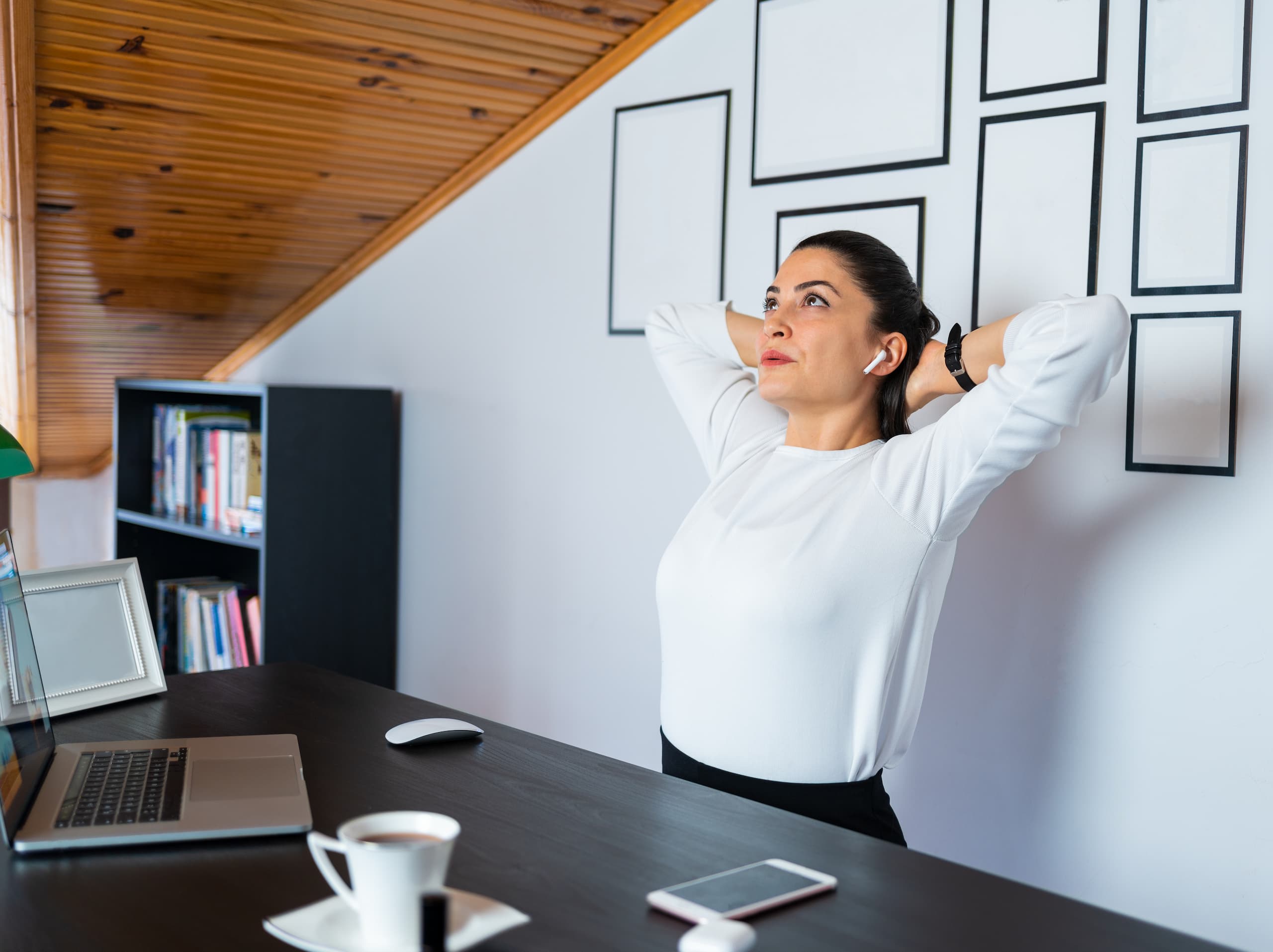 Business woman stretching at work