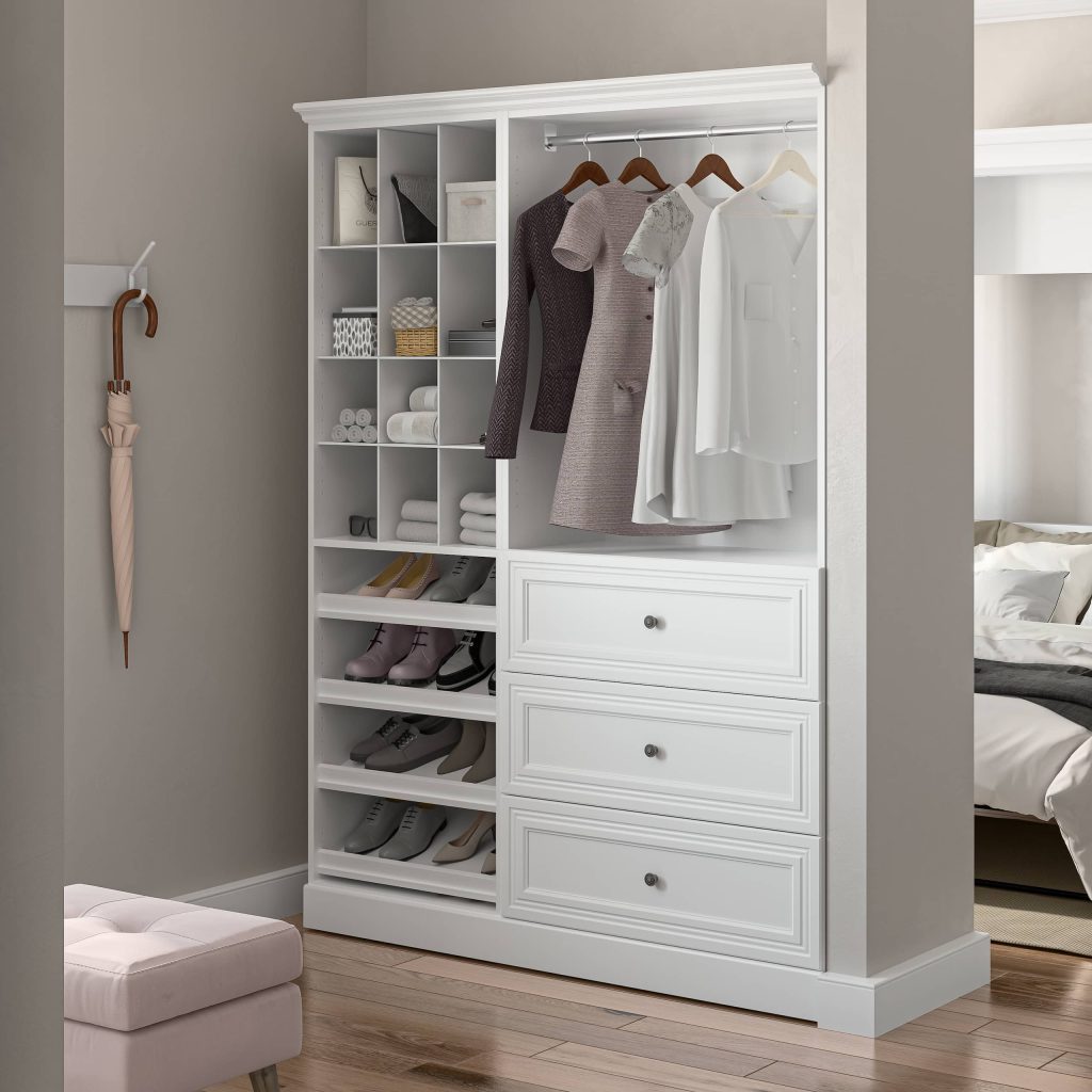 Bestar closet organizer in a beautiful walk-in closet