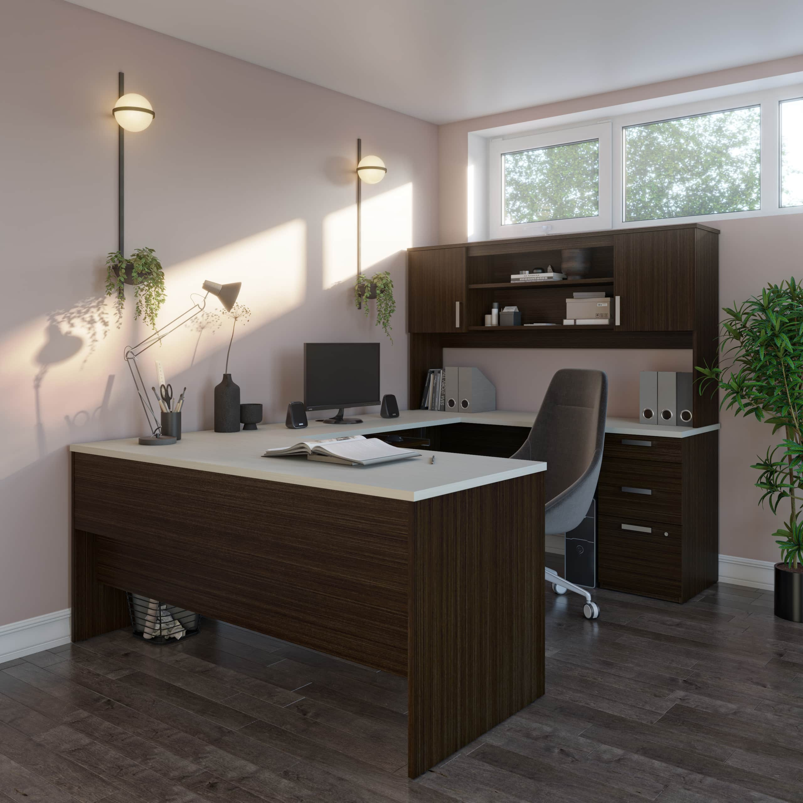 Peaceful home office space with plants and soft pink walls