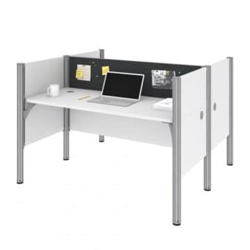 Two Face-to-Face Office Cubicles with Gray Tack Boards and Low Privacy Panels