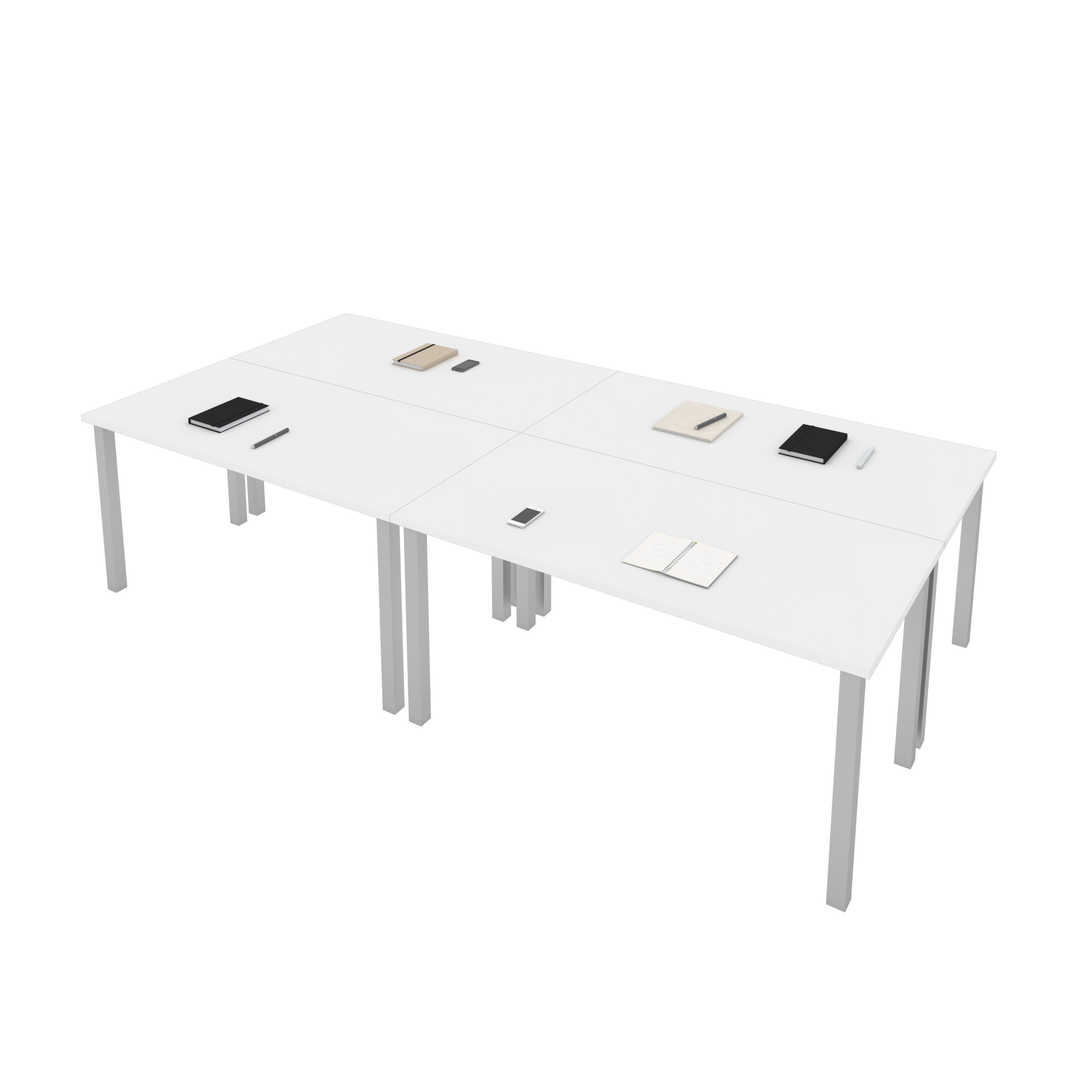 Quatre tables de bureau 60L x 30P avec pattes carrées en métal